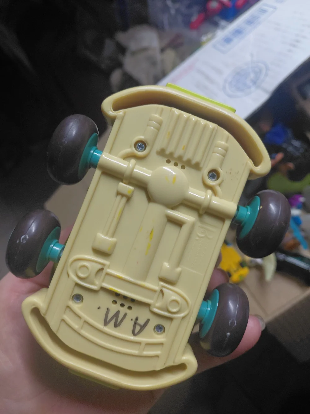 B. toys Just B You Pull-Back Taxi is a chunky olive green toy car